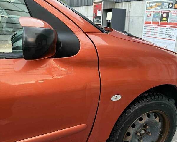 Оранжевый Пежо 206, объемом двигателя 1.12 л и пробегом 272 тыс. км за 1700 $, фото 2 на Automoto.ua