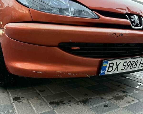 Оранжевый Пежо 206, объемом двигателя 1.12 л и пробегом 272 тыс. км за 1700 $, фото 4 на Automoto.ua