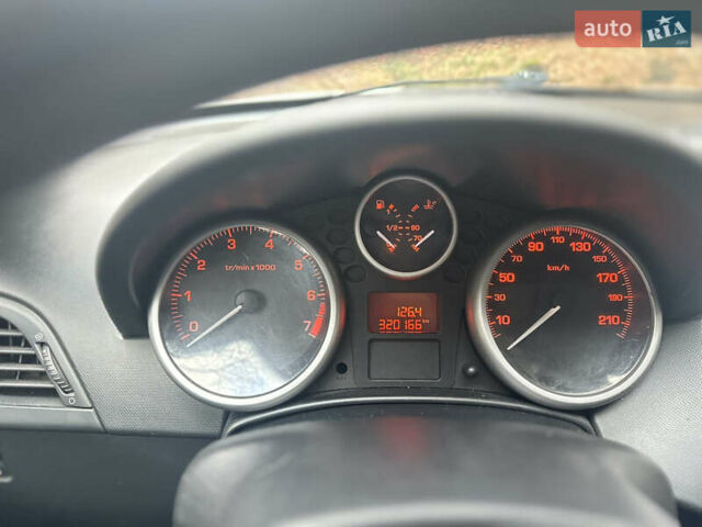 Белый Пежо 207, объемом двигателя 1.36 л и пробегом 320 тыс. км за 3800 $, фото 7 на Automoto.ua