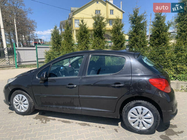 Черный Пежо 207, объемом двигателя 1.36 л и пробегом 263 тыс. км за 3500 $, фото 1 на Automoto.ua