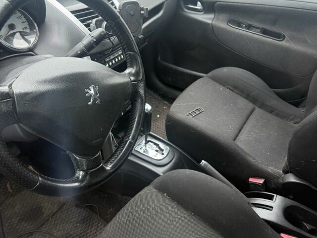 Черный Пежо 207, объемом двигателя 1.6 л и пробегом 100 тыс. км за 1700 $, фото 5 на Automoto.ua
