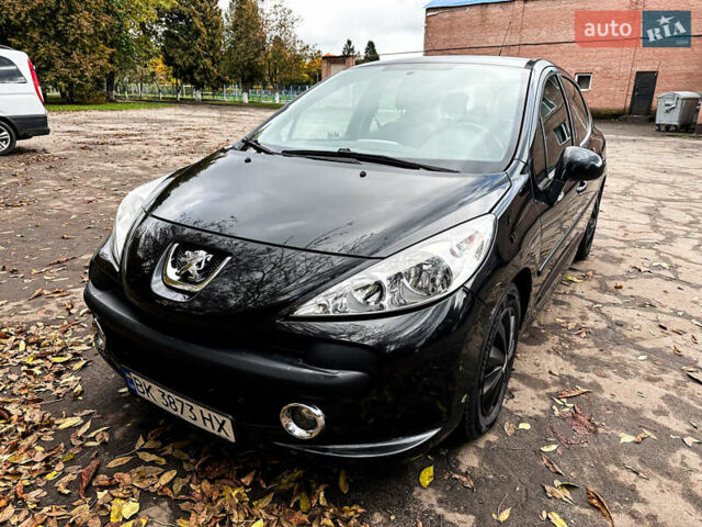 Черный Пежо 207, объемом двигателя 1.4 л и пробегом 206 тыс. км за 4100 $, фото 1 на Automoto.ua