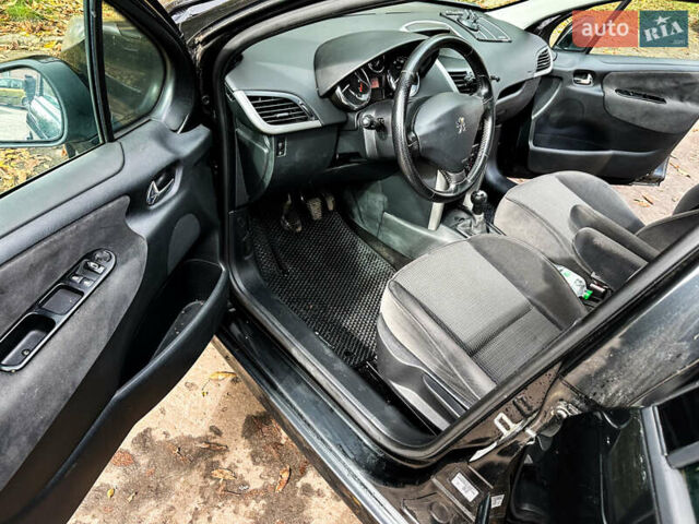 Черный Пежо 207, объемом двигателя 1.4 л и пробегом 206 тыс. км за 4100 $, фото 14 на Automoto.ua