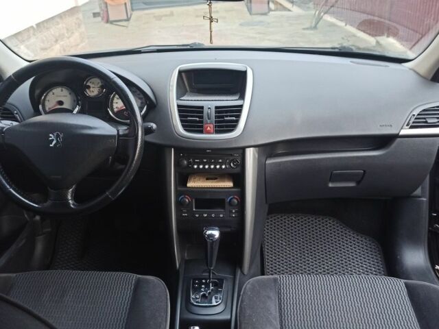 Черный Пежо 207, объемом двигателя 1.6 л и пробегом 280 тыс. км за 4850 $, фото 4 на Automoto.ua