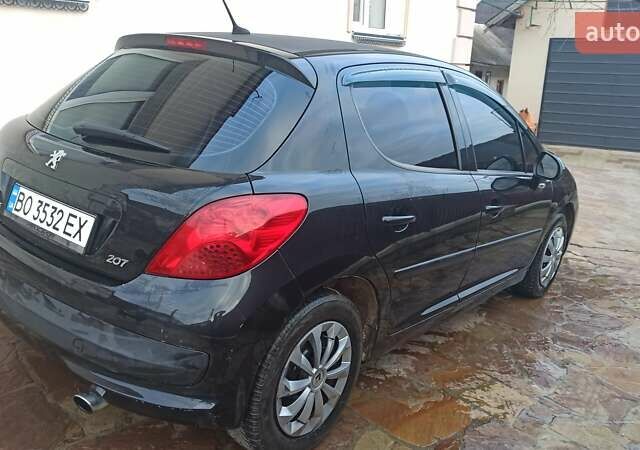Черный Пежо 207, объемом двигателя 1.6 л и пробегом 280 тыс. км за 4850 $, фото 3 на Automoto.ua