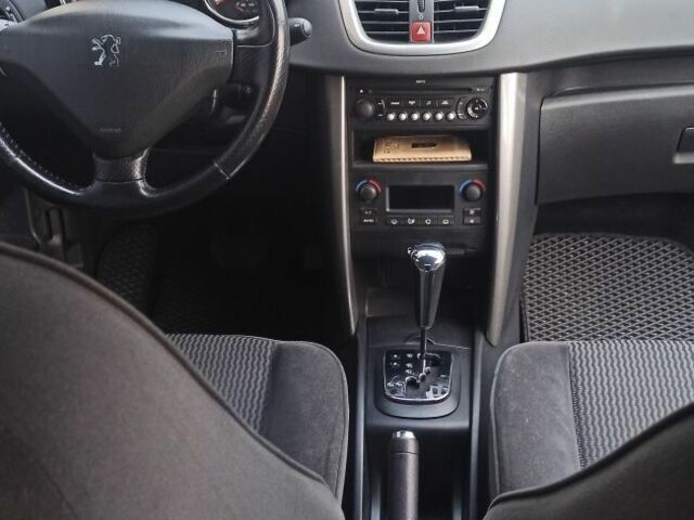 Черный Пежо 207, объемом двигателя 1.6 л и пробегом 280 тыс. км за 4850 $, фото 3 на Automoto.ua