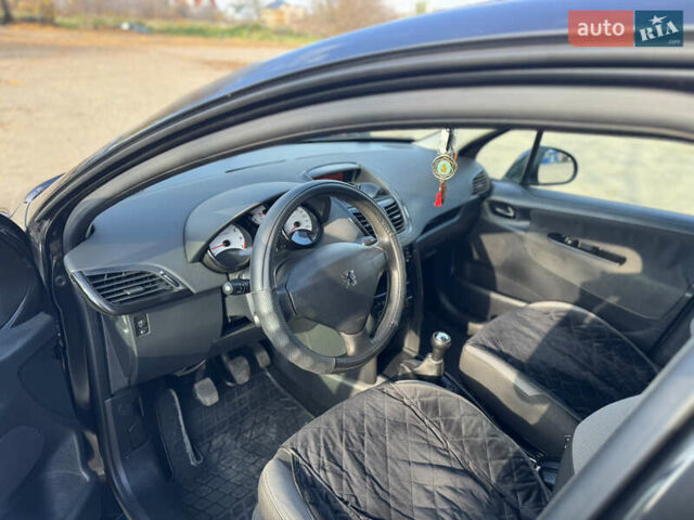 Чорний Пежо 207, об'ємом двигуна 1.4 л та пробігом 275 тис. км за 5500 $, фото 9 на Automoto.ua