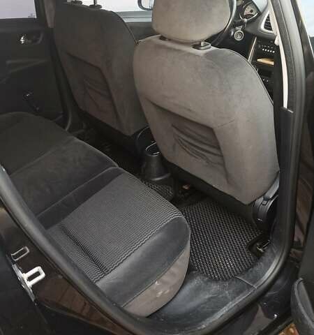 Черный Пежо 207, объемом двигателя 1.6 л и пробегом 280 тыс. км за 4850 $, фото 5 на Automoto.ua