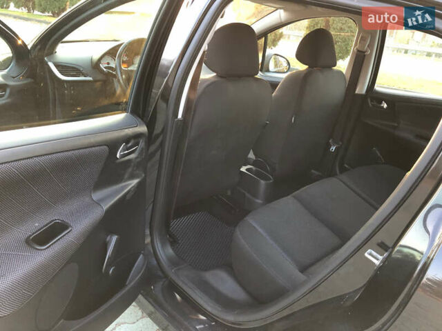 Черный Пежо 207, объемом двигателя 1.6 л и пробегом 184 тыс. км за 4500 $, фото 10 на Automoto.ua