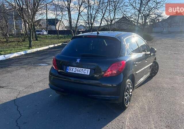 Черный Пежо 207, объемом двигателя 1.36 л и пробегом 145 тыс. км за 4900 $, фото 2 на Automoto.ua