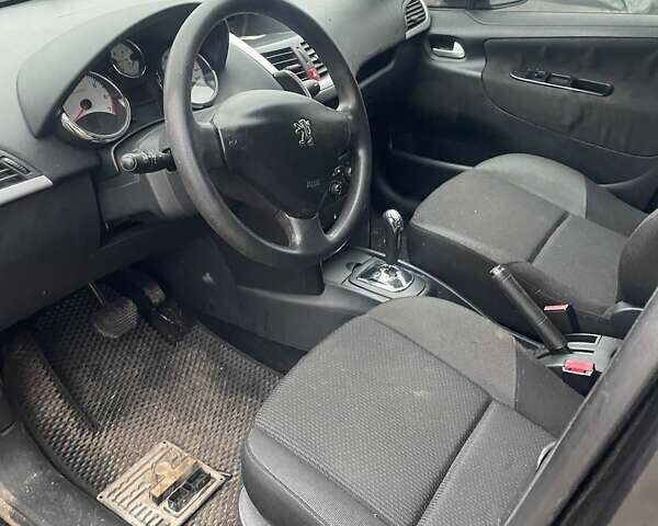 Чорний Пежо 207, об'ємом двигуна 1.36 л та пробігом 130 тис. км за 1699 $, фото 5 на Automoto.ua