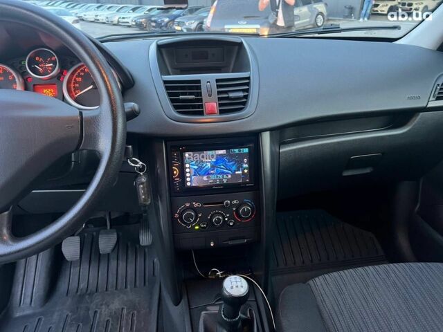 Чорний Пежо 207, об'ємом двигуна 1.4 л та пробігом 145 тис. км за 6090 $, фото 23 на Automoto.ua
