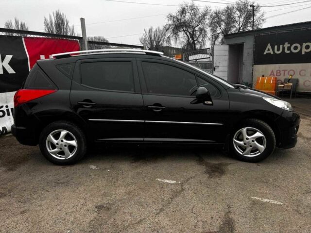 Чорний Пежо 207, об'ємом двигуна 1.4 л та пробігом 180 тис. км за 4990 $, фото 5 на Automoto.ua