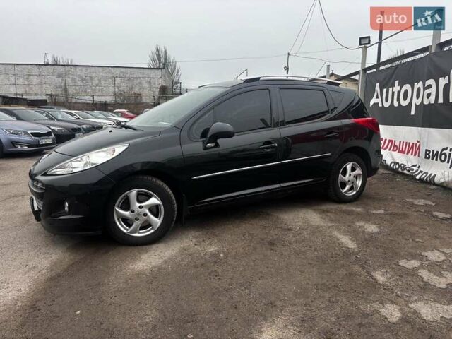 Черный Пежо 207, объемом двигателя 1.4 л и пробегом 180 тыс. км за 4990 $, фото 1 на Automoto.ua