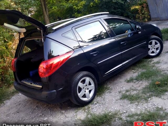 Черный Пежо 207, объемом двигателя 1.4 л и пробегом 225 тыс. км за 5500 $, фото 4 на Automoto.ua