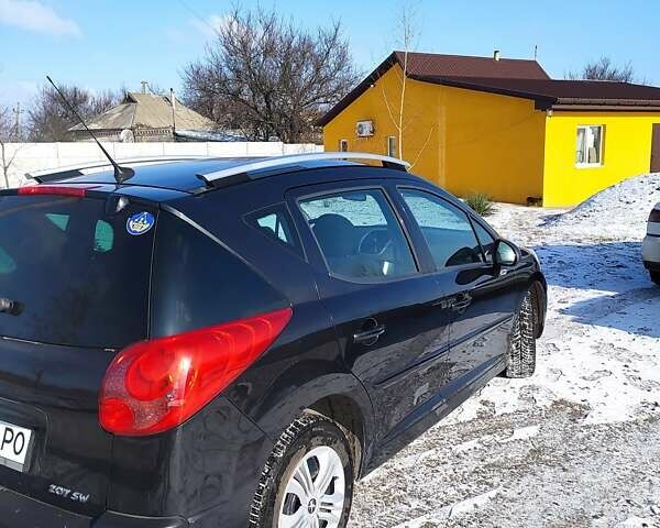 Чорний Пежо 207, об'ємом двигуна 1.4 л та пробігом 200 тис. км за 4500 $, фото 2 на Automoto.ua
