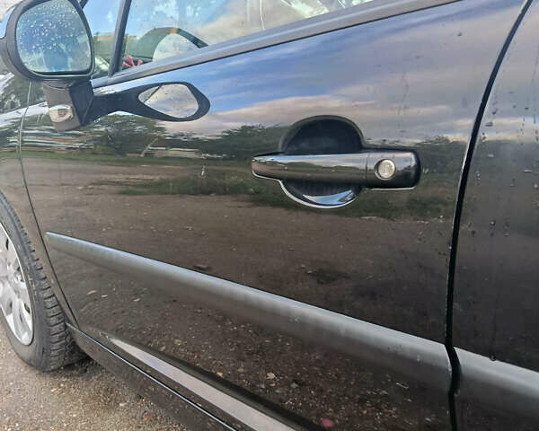 Чорний Пежо 207, об'ємом двигуна 1.6 л та пробігом 165 тис. км за 5150 $, фото 16 на Automoto.ua