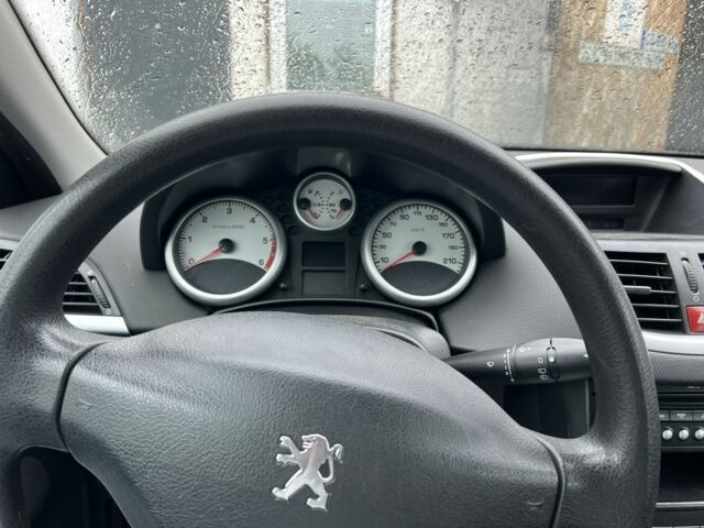 Черный Пежо 207, объемом двигателя 1.6 л и пробегом 230 тыс. км за 3820 $, фото 4 на Automoto.ua