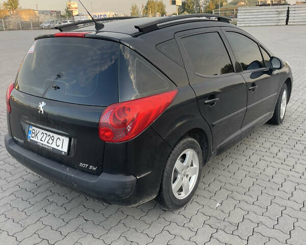 Черный Пежо 207, объемом двигателя 1.36 л и пробегом 243 тыс. км за 3200 $, фото 8 на Automoto.ua