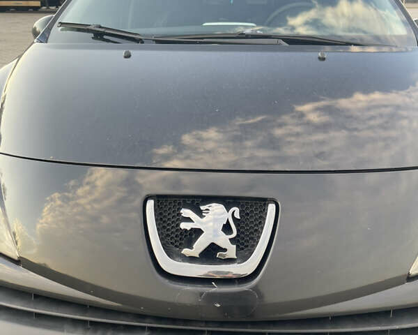 Черный Пежо 207, объемом двигателя 1.36 л и пробегом 243 тыс. км за 3200 $, фото 4 на Automoto.ua