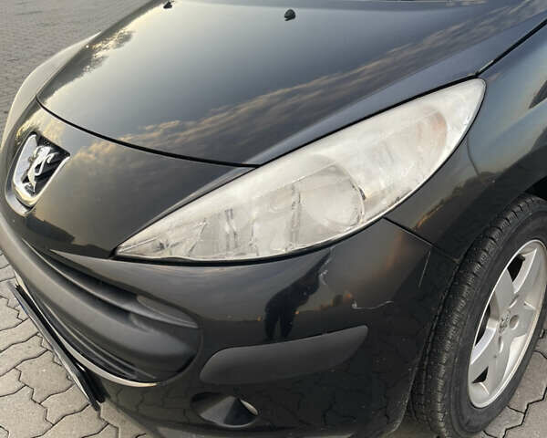 Черный Пежо 207, объемом двигателя 1.36 л и пробегом 243 тыс. км за 3200 $, фото 5 на Automoto.ua