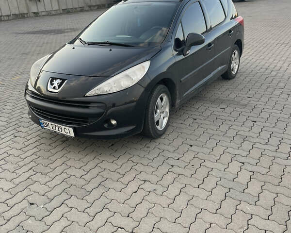 Черный Пежо 207, объемом двигателя 1.36 л и пробегом 243 тыс. км за 3200 $, фото 1 на Automoto.ua