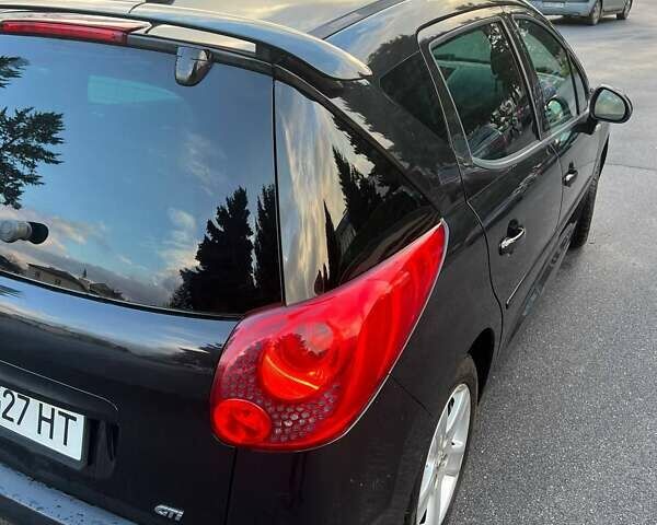 Черный Пежо 207, объемом двигателя 1.6 л и пробегом 205 тыс. км за 4250 $, фото 13 на Automoto.ua