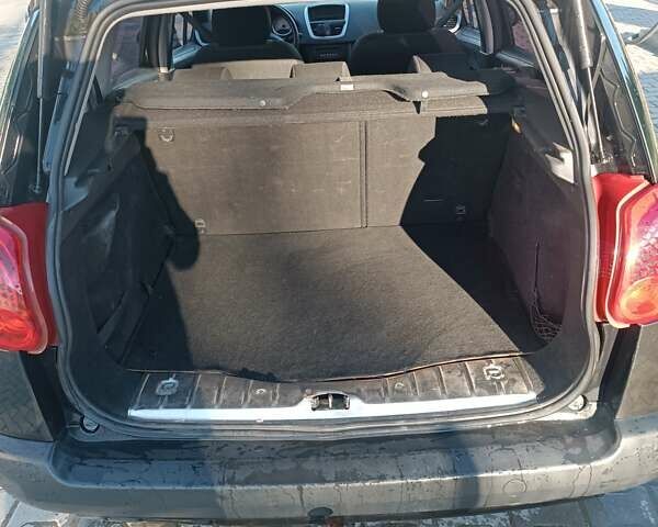 Черный Пежо 207, объемом двигателя 1.4 л и пробегом 285 тыс. км за 3500 $, фото 5 на Automoto.ua