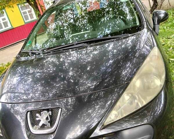Черный Пежо 207, объемом двигателя 1.4 л и пробегом 196 тыс. км за 5000 $, фото 2 на Automoto.ua