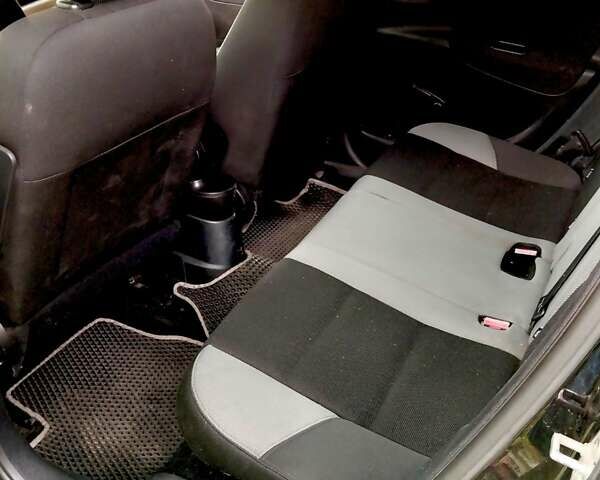 Черный Пежо 207, объемом двигателя 1.4 л и пробегом 196 тыс. км за 5000 $, фото 5 на Automoto.ua