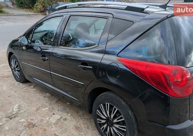 Черный Пежо 207, объемом двигателя 1.56 л и пробегом 255 тыс. км за 5000 $, фото 2 на Automoto.ua