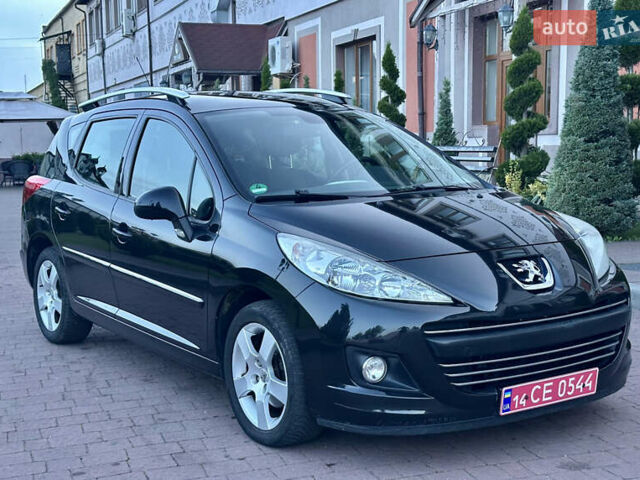 Черный Пежо 207, объемом двигателя 1.6 л и пробегом 170 тыс. км за 4950 $, фото 1 на Automoto.ua