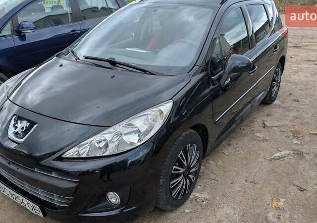 Черный Пежо 207, объемом двигателя 1.56 л и пробегом 255 тыс. км за 5000 $, фото 1 на Automoto.ua