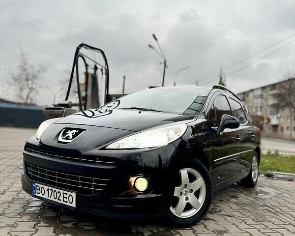 Черный Пежо 207, объемом двигателя 1.4 л и пробегом 125 тыс. км за 5300 $, фото 1 на Automoto.ua