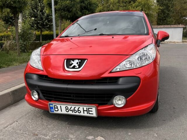 Красный Пежо 207, объемом двигателя 1.4 л и пробегом 139 тыс. км за 5200 $, фото 1 на Automoto.ua