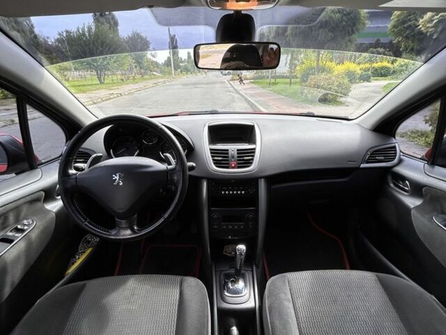 Красный Пежо 207, объемом двигателя 1.4 л и пробегом 139 тыс. км за 5200 $, фото 5 на Automoto.ua