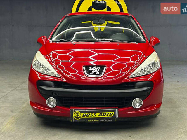 Красный Пежо 207, объемом двигателя 1.36 л и пробегом 169 тыс. км за 4500 $, фото 1 на Automoto.ua