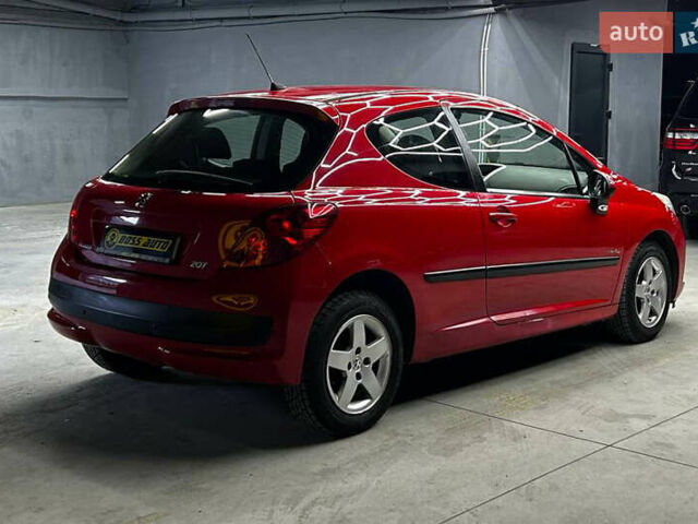 Красный Пежо 207, объемом двигателя 1.36 л и пробегом 169 тыс. км за 4500 $, фото 5 на Automoto.ua