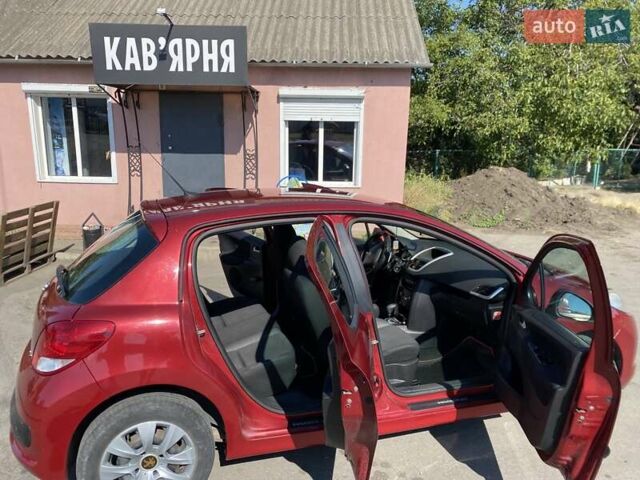 Красный Пежо 207, объемом двигателя 1.6 л и пробегом 150 тыс. км за 5700 $, фото 10 на Automoto.ua