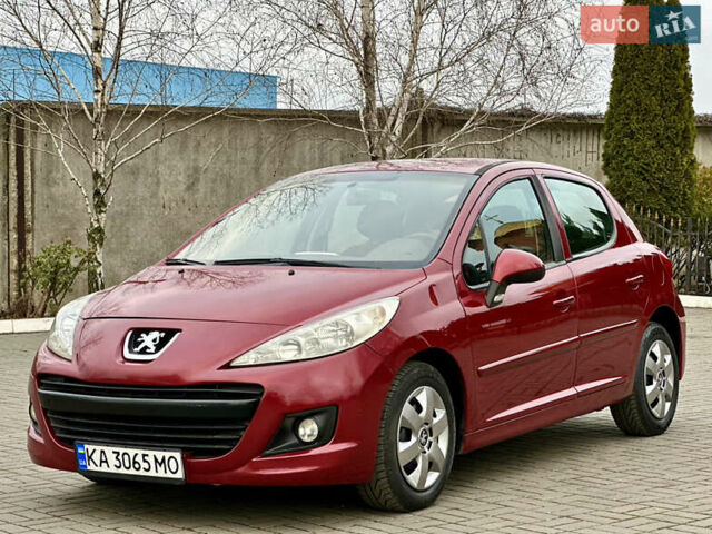 Красный Пежо 207, объемом двигателя 1.36 л и пробегом 184 тыс. км за 5650 $, фото 1 на Automoto.ua