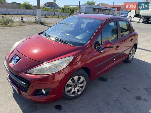 Красный Пежо 207, объемом двигателя 1.6 л и пробегом 150 тыс. км за 5700 $, фото 4 на Automoto.ua