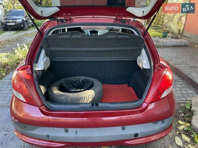 Пежо 207 2010 в Николаеве на Automoto.ua Красный Пежо 207, объемом двигателя 1.36 л и пробегом 103 тыс. км за 5800 $, фото 7 на Automoto.ua