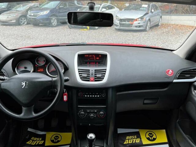 Красный Пежо 207, объемом двигателя 1.4 л и пробегом 209 тыс. км за 5800 $, фото 8 на Automoto.ua