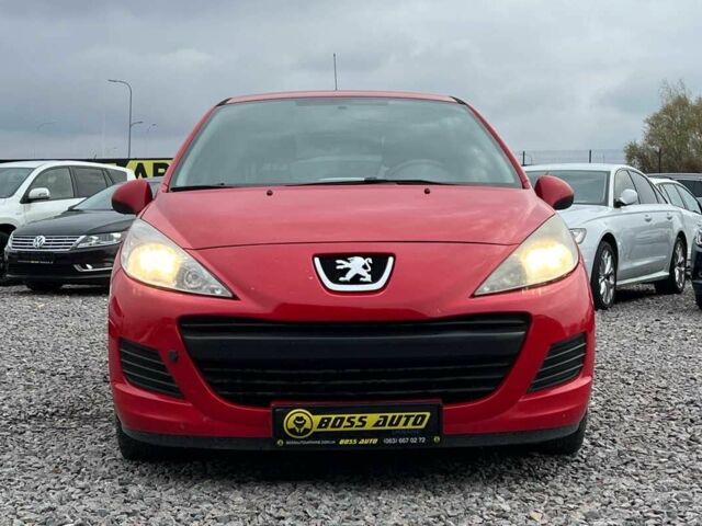 Красный Пежо 207, объемом двигателя 1.4 л и пробегом 209 тыс. км за 5800 $, фото 1 на Automoto.ua