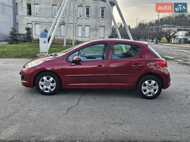 Красный Пежо 207, объемом двигателя 1.36 л и пробегом 180 тыс. км за 4300 $, фото 4 на Automoto.ua
