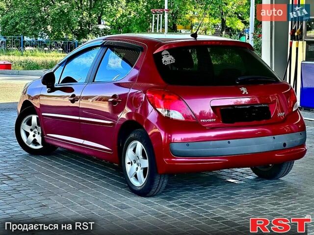 Красный Пежо 207, объемом двигателя 1.4 л и пробегом 103 тыс. км за 5600 $, фото 5 на Automoto.ua