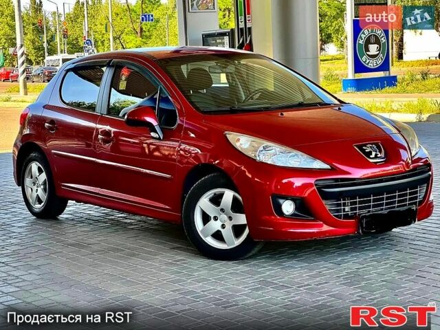 Красный Пежо 207, объемом двигателя 1.4 л и пробегом 103 тыс. км за 5600 $, фото 1 на Automoto.ua