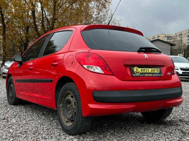 Красный Пежо 207, объемом двигателя 1.4 л и пробегом 209 тыс. км за 5800 $, фото 3 на Automoto.ua