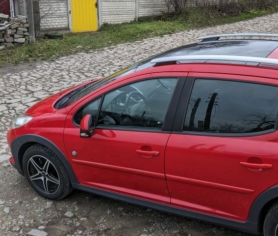 Красный Пежо 207, объемом двигателя 1.6 л и пробегом 230 тыс. км за 5300 $, фото 6 на Automoto.ua