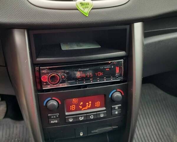 Красный Пежо 207, объемом двигателя 1.6 л и пробегом 231 тыс. км за 3999 $, фото 4 на Automoto.ua